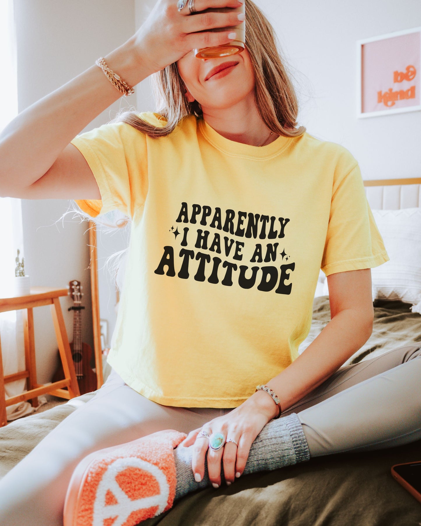 woman wearing sarcastic attitude shirt in retro font