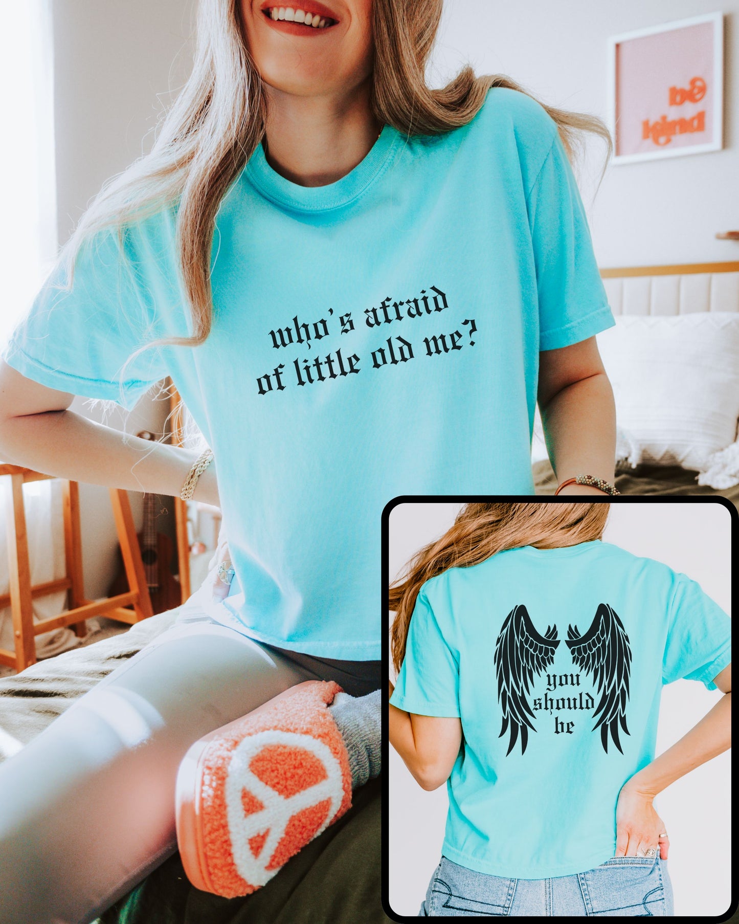 woman wearing comfort colors crop top in chalky mint with who’s afraid of little old me text on front and wings with you should be on back