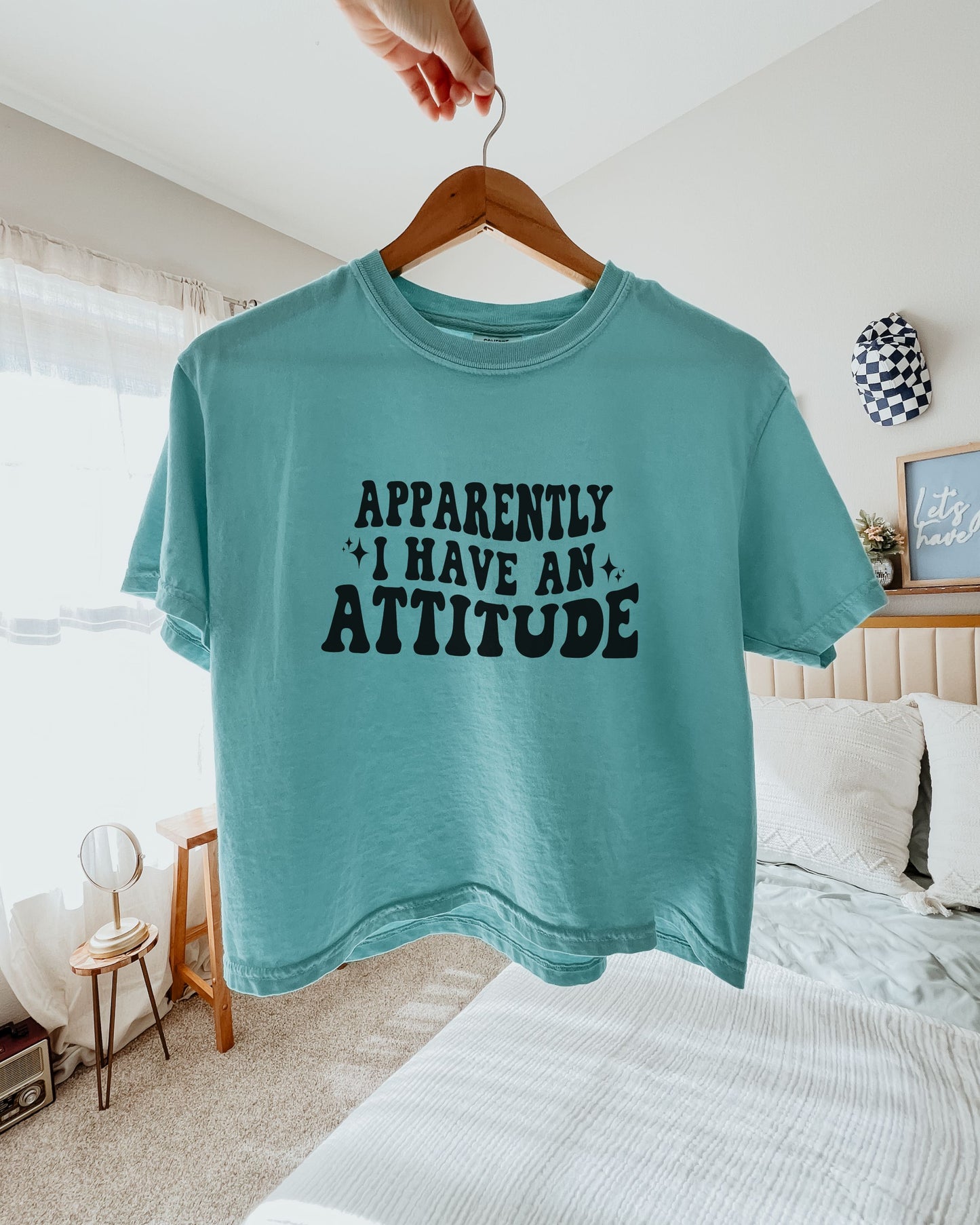 woman wearing sarcastic attitude shirt in retro font