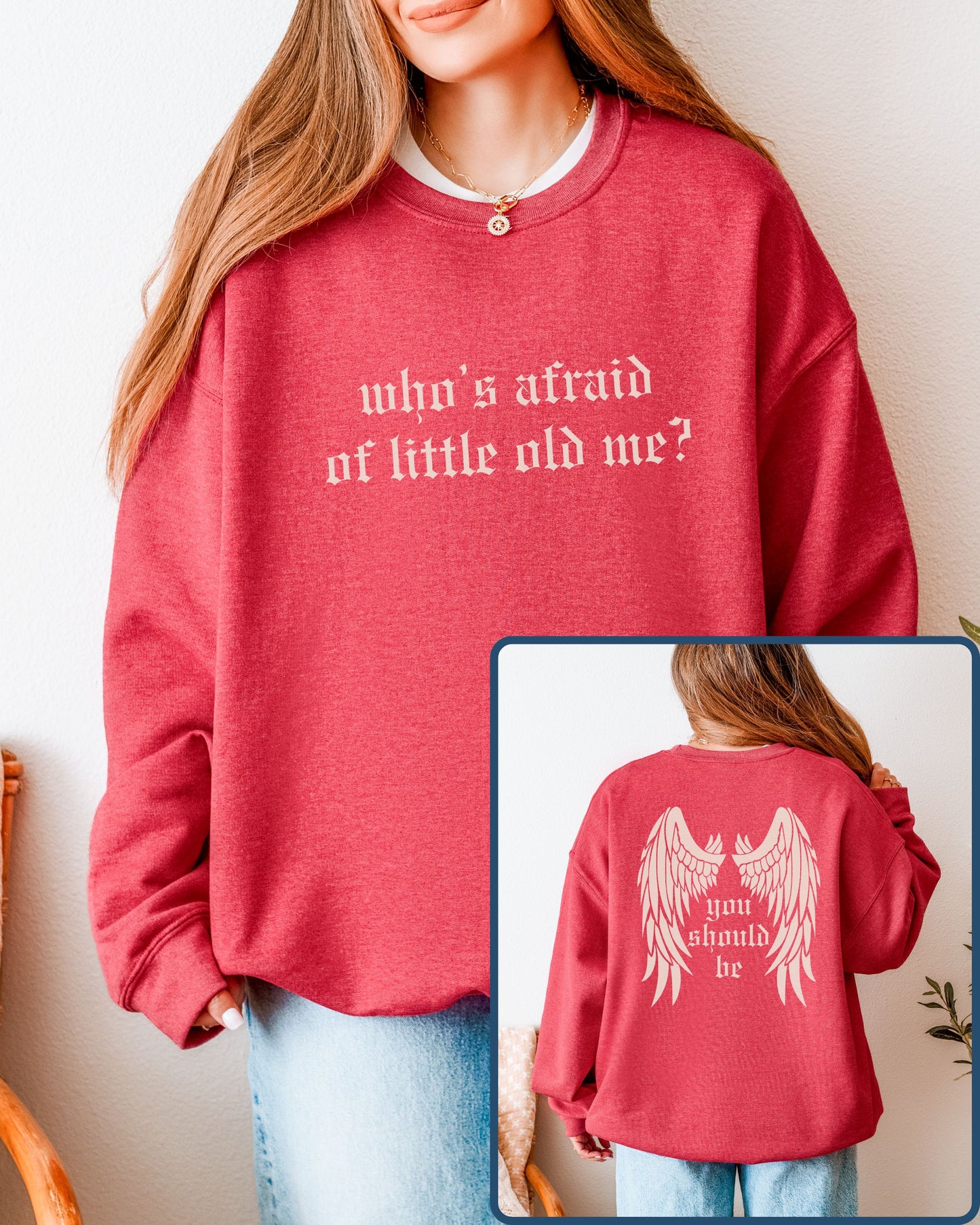 Red sweatshirt with text 'who's afraid of little old me?' worn by a person, with a close-up of the back showing 'you should be'.