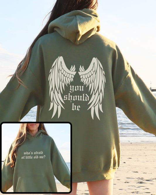 woman wearing who’s afraid of little old me hoodie, relaxed oversized fit
