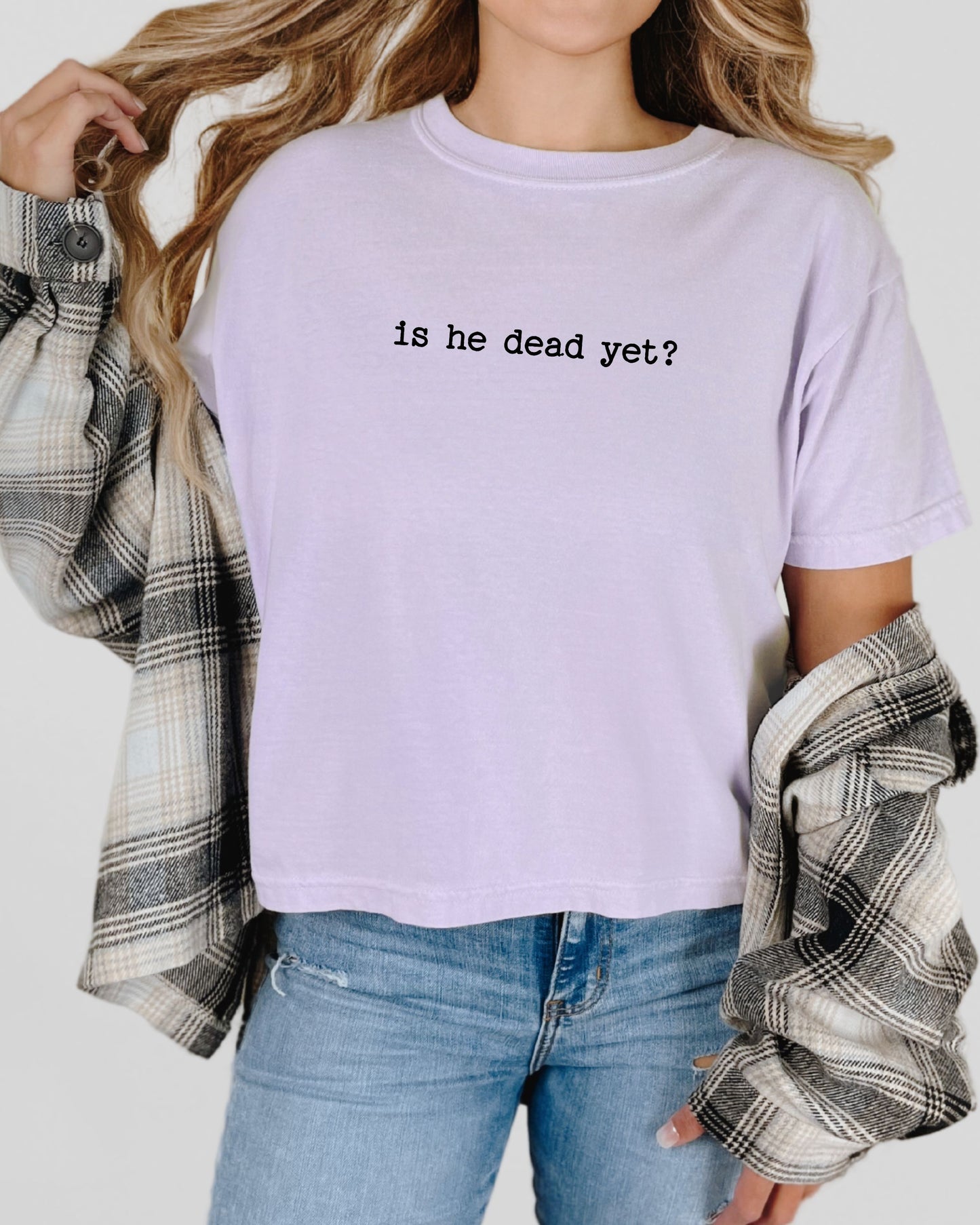 woman wearing is he dead yet dark humor crop top