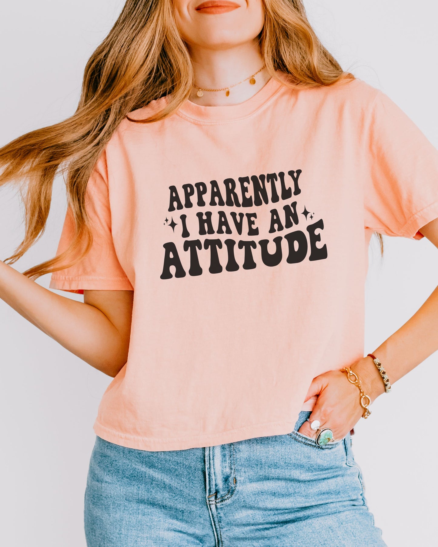 woman wearing sarcastic attitude shirt in retro font