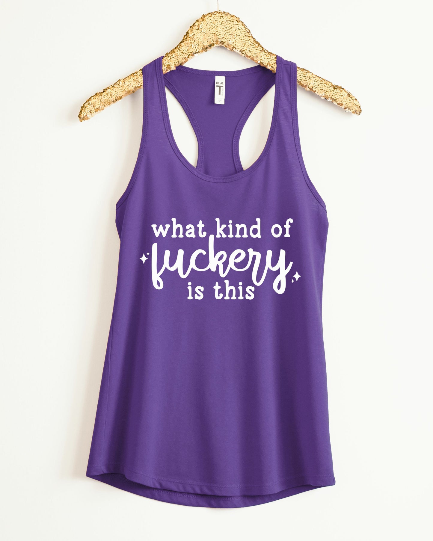Purple tank top with white text on a hanger against a white background