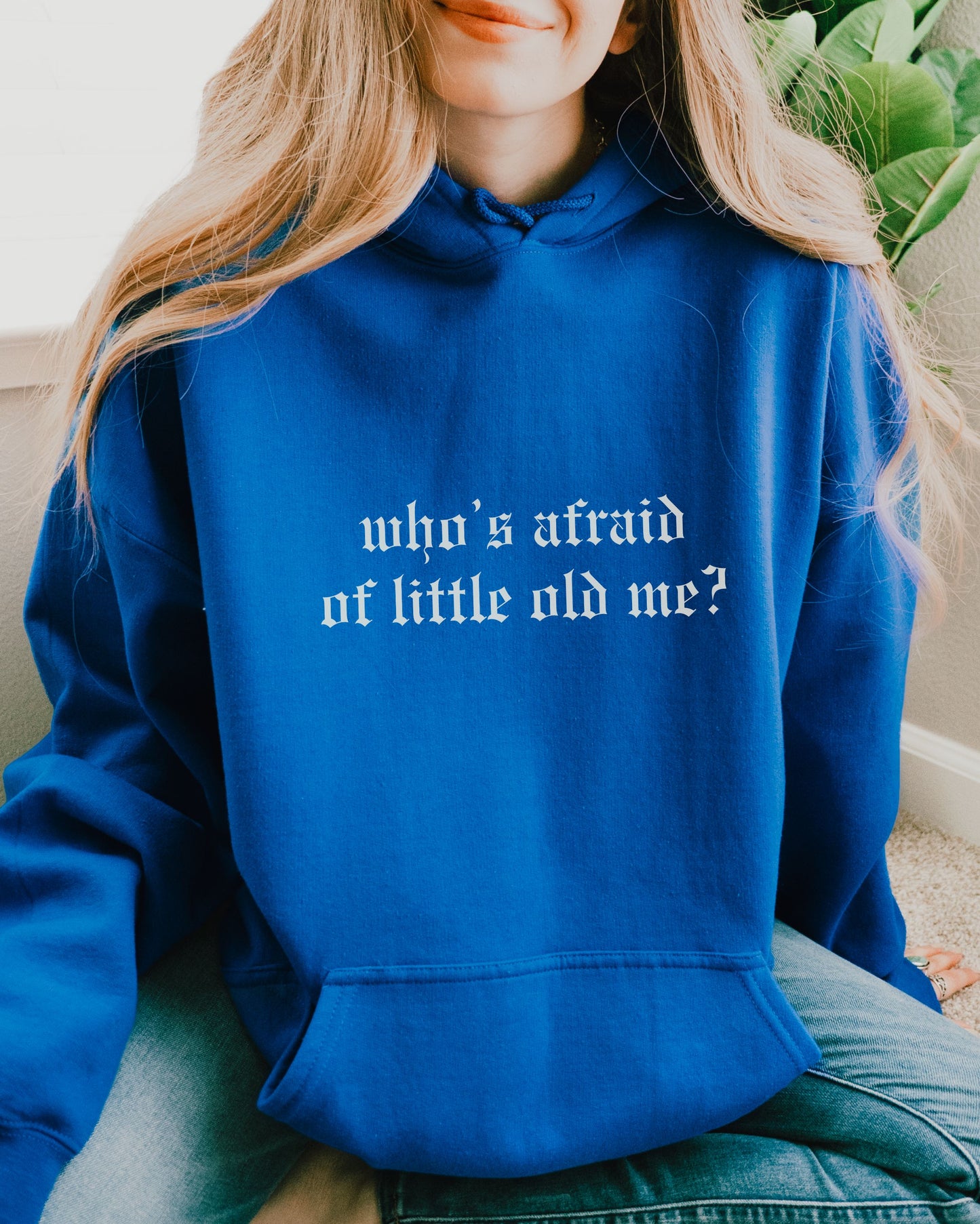 woman wearing who’s afraid of little old me hoodie, relaxed oversized fit