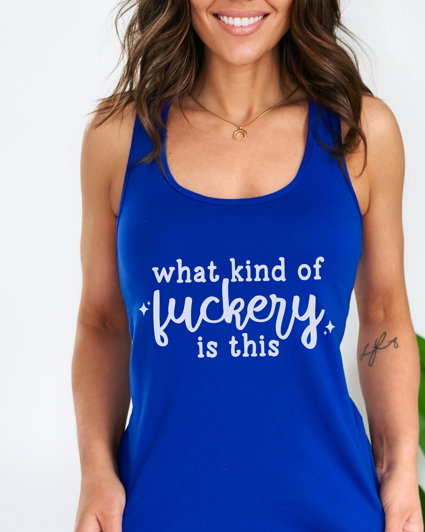 Woman wearing a blue tank top with text on a white background