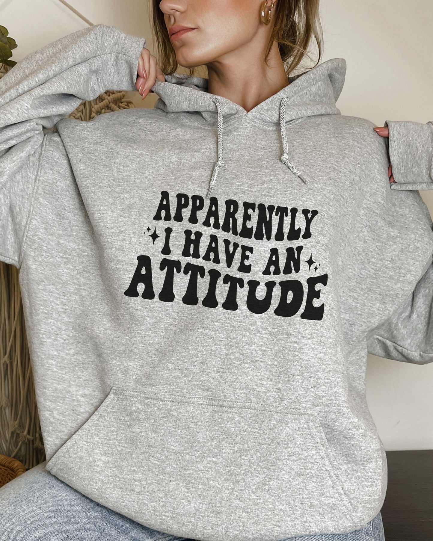 woman wearing sarcastic graphic hoodie with attitude quote
