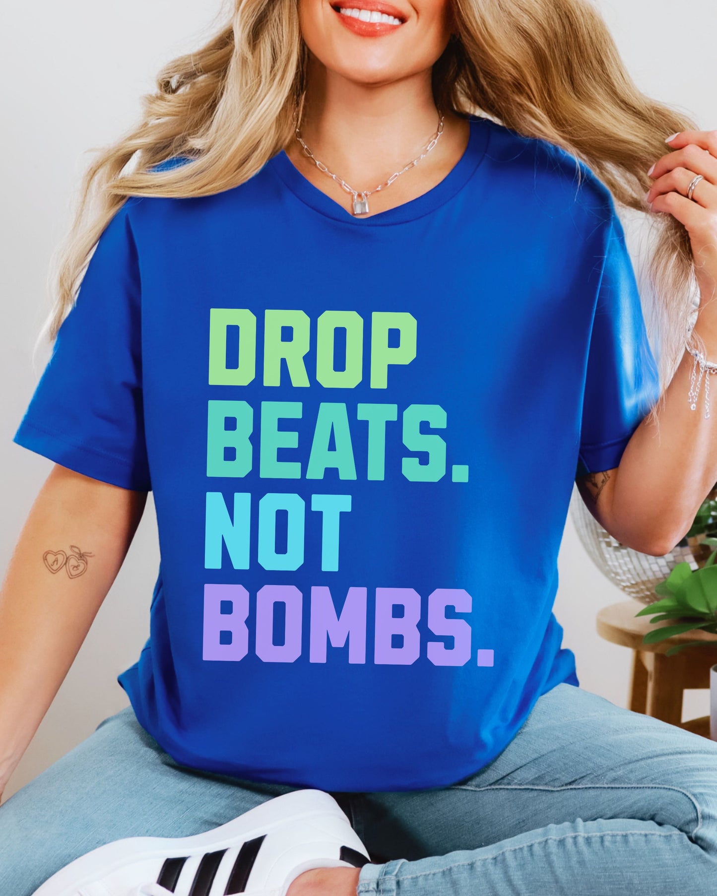 Drop Beats Not Bombs T-Shirt – Bella + Canvas Colorful Peace Music Tee