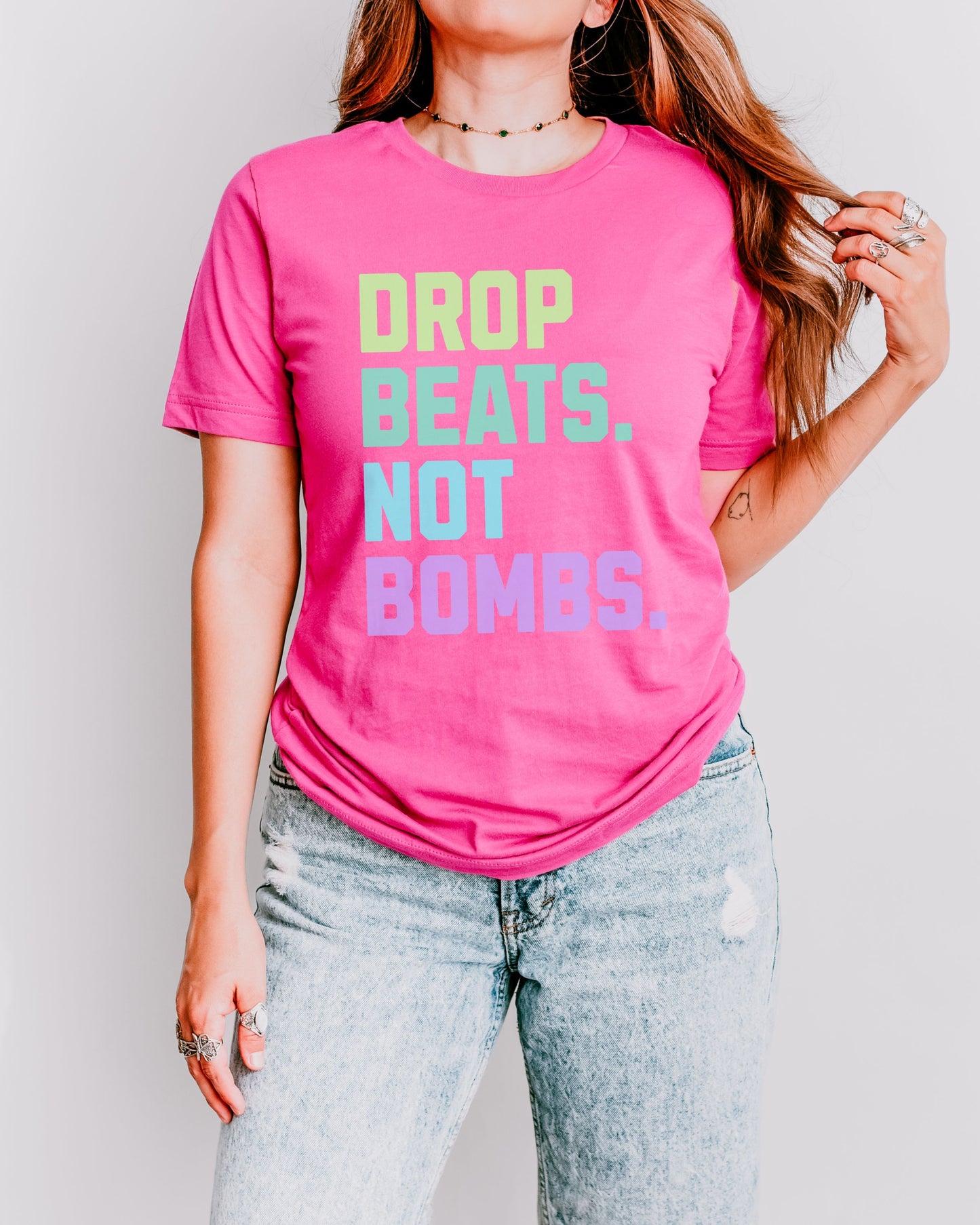Drop Beats Not Bombs T-Shirt – Bella + Canvas Colorful Peace Music Tee