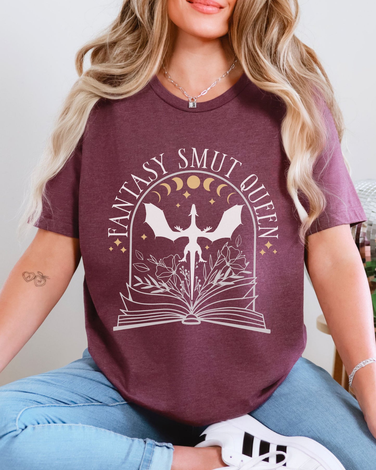 Person wearing a purple t-shirt with 'Fantasy Smut Queen' design.
