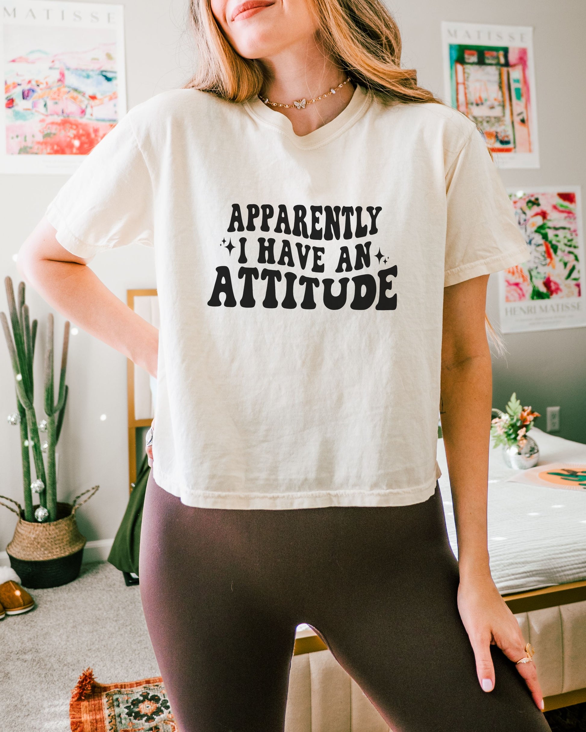 woman wearing sarcastic attitude shirt in retro font
